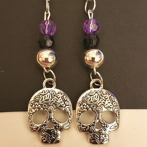 Handmade black silver purple beaded skull dangle earrings